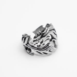 Side view of The Tormented Dragon Ring in Stainless Steel, showcasing its intricate details and timeless design for everyday wear.